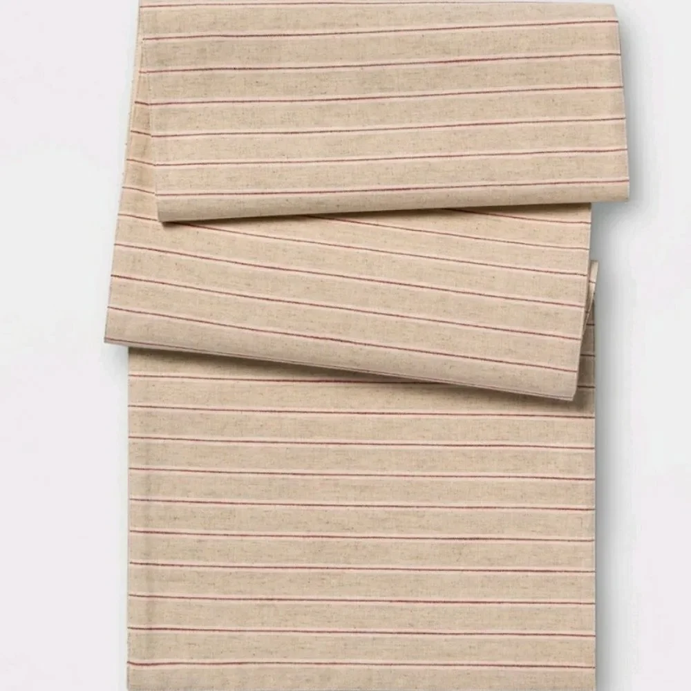 Table runner by threshold oatmeal with red stripe